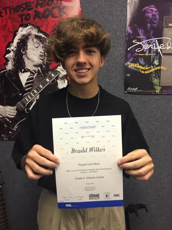 Bradd Wilkes passes Grade 4 with Merit